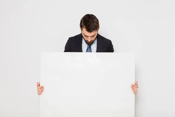Pohledný muž s prázdný panel — Stock fotografie