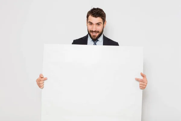 Handsome man with empty panel — Stock Photo, Image