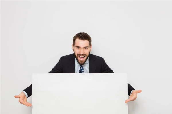 Hombre guapo con el panel vacío — Foto de Stock