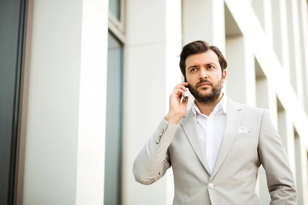 Handsome Businessman Having Conversation Cellphone Business Center Background — Stock Photo, Image