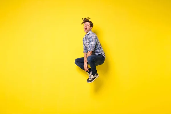 Mid Air Shot Handsome Young Man Jumping Gesturing Showing Excitment — Stock Photo, Image