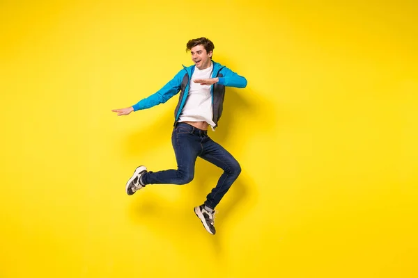 Mid Air Shot Handsome Young Man Jumping Gesturing Showing Excitment — Stock Photo, Image