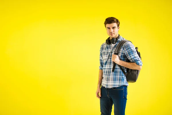 What Your Outfit Work Young Person Backpack Headphones Yellow Background — Stock Photo, Image
