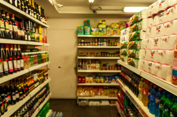 Interior de una pequeña tienda, borrosa y desenfocada — Foto de Stock