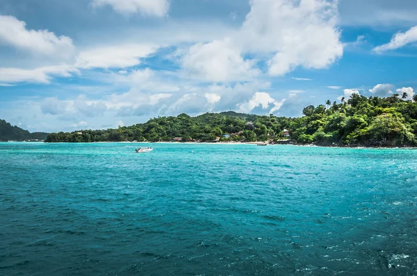 Green island in the blue ocean