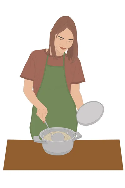 Önlüklü genç kadın renkli bir kabın içinde yemek hazırlıyor.