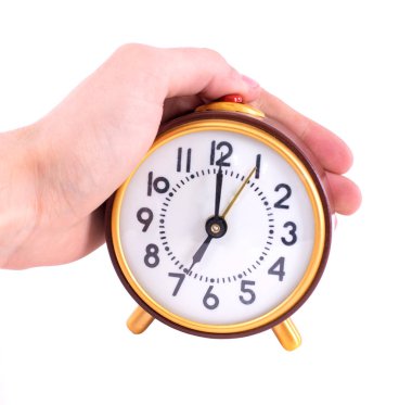 Beyaz arka plan üzerinde izole retro saat. Yakın çekim.