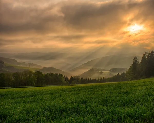 vintage countryside epic spring sunrise,fog,hills,fields,dramatic sky
