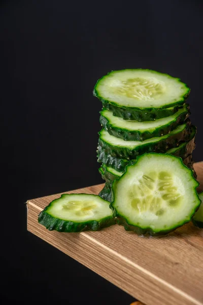 Close Stack Cucumber Slices Corner Table Selective Focus Black Background — Stock Photo, Image