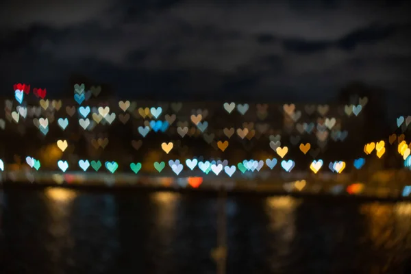 Noční srdce bokeh pozadí. Valentýn pozadí — Stock fotografie