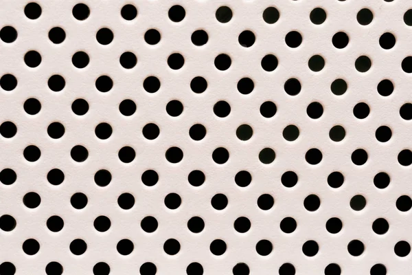 Plastic surface with multiple holes texture pattern background — Stock Photo, Image