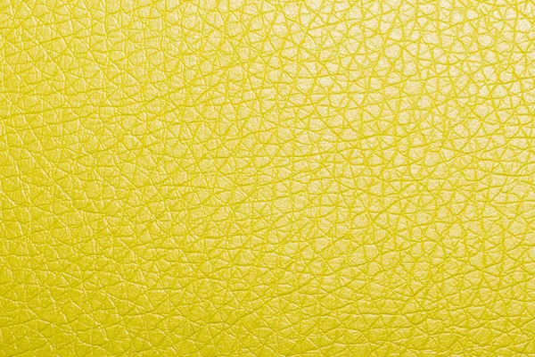yellow leather background or texture. texture photo closeup