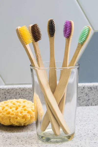 Bamboo Eco Toothbrushes Multicolored Bright Bristles Glass Bathroom — Stock Photo, Image