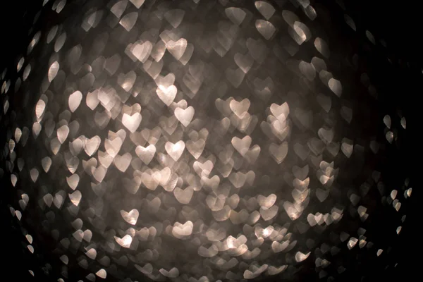 Background with silver bokeh in the shape of a heart. — 스톡 사진