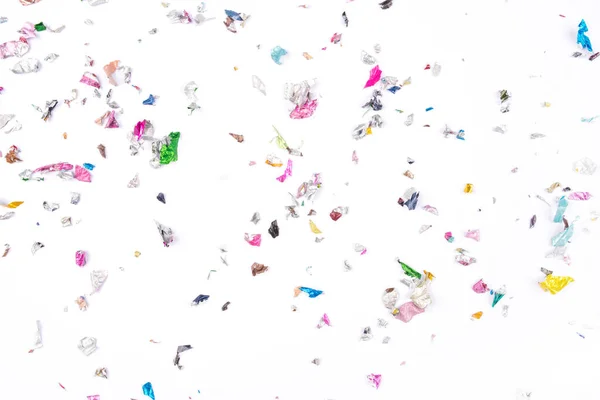 Mnohobarevné konfety na bílém pozadí. — Stock fotografie