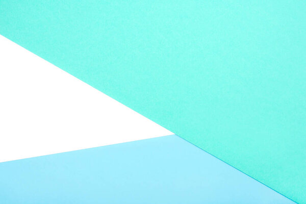 Абстрактный геометрический фон из белого, зеленого и синего картона
.