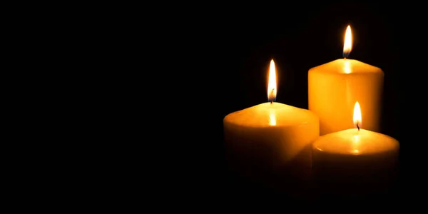 Flame candles isolated on black background. — Stock Photo, Image