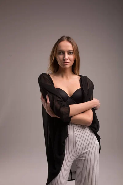 Fashion Look Girl Pants Stripes Black Top Plane Studio Background — Φωτογραφία Αρχείου
