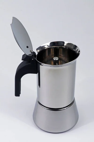 Moka coffee maker in steel for home coffee preparation, typical Italian cuisine