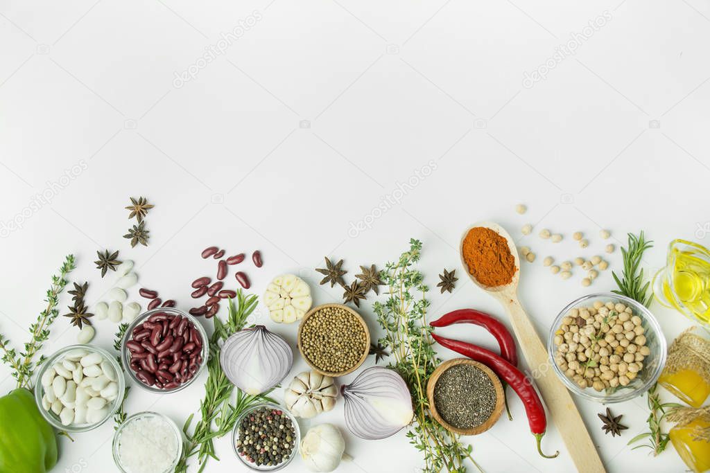 Cooking background, herbs, salt, spices, olive oil, white backgr