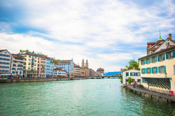 View of the historic city center of Zurich with famous Fraumunster Church and river Limmat