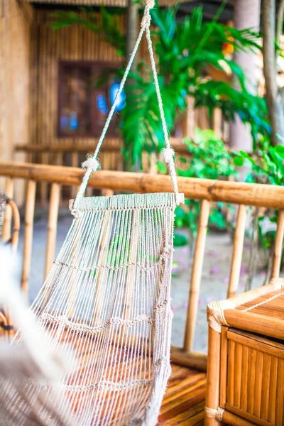 Hammock on terrace of cozy room in hotel in summer day — Stock Photo, Image