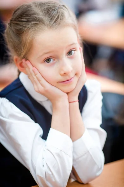 Portrait of adorable little school girl in class — Stock Photo, Image