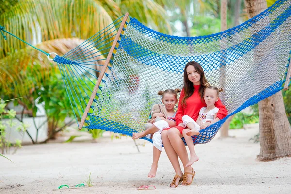 Beautiful mother and daughters on Caribbean beach — Stock Photo, Image