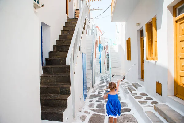 Girl in dresses having fun outdoors on Mykonos streets — Stock Photo, Image