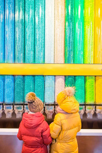 Famous M M Candies at candy dispenser machines in the Times Square shop in New York — Stock Photo, Image