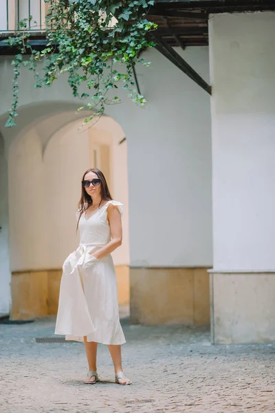 Young woman in Vienna outdoors during holidays in Europe.