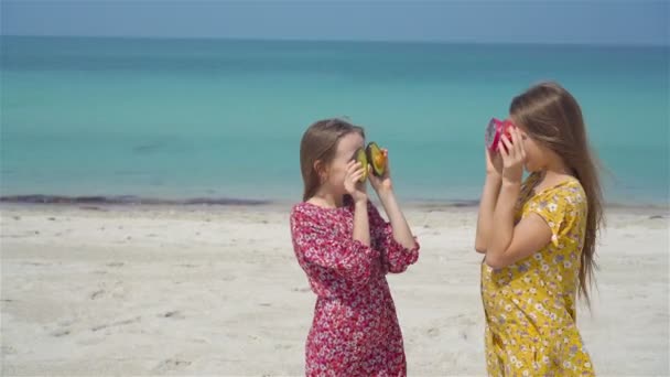 Little girls having fun enjoying vacation on tropical beach — Stock Video