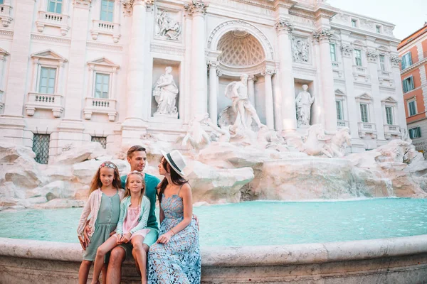 Happy young parents and little kids smiling traveling together on european travel vacation holiday in Europe — Stock Photo, Image