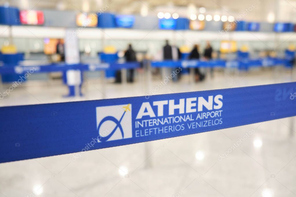 Athens International Airport Eleftherios Venizelos, Greece - November 4, 2019: Retractable belt, portable ribbon barrier, fencing tape.