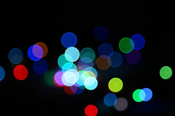 Abstract blur light background.Colorful decorating light.abstract light.Beautiful colorful blur on black