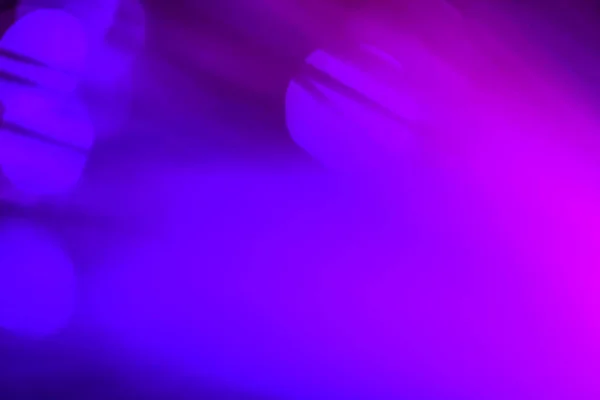 light purple neon light abstract Neon bright lens flare colored on black background.dark abstract futuristic background and Neon