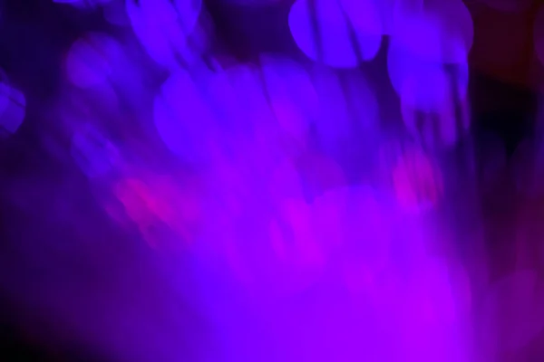 light purple neon light abstract Neon bright lens flare colored on black background.dark abstract futuristic background and Neon