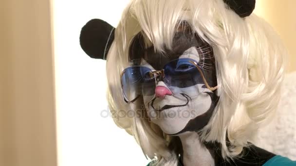 Face of a girl dressed as a skunk — Stock Video
