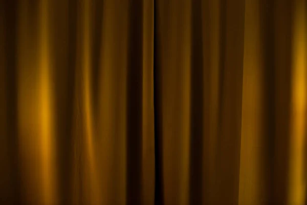 Bruin-bronzen theatergordijn. Achtergrond van black-out gordijnen. — Stockfoto