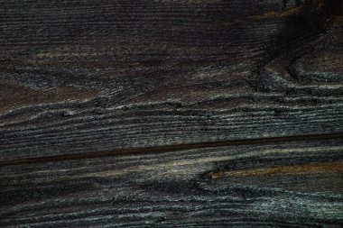 Koyu renk tahta dokusuna yakın çekim. Makro odun fırçaladı.