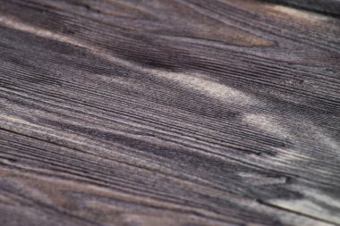 Koyu renk tahta dokusuna yakın çekim. Makro odun fırçaladı.