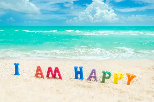 Zaloguj się "I 'm Happy" na tropikalnej plaży Miami — Zdjęcie stockowe