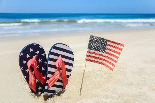 Patriótico EUA fundo na praia de areia Fotografias De Stock Royalty-Free