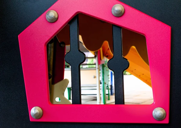 Window of small plastic house in the playground. — Stock Photo, Image