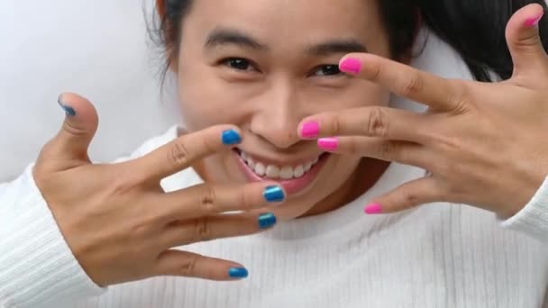 Close Female Smiley Face Showing Hands Paint Nail Varnish Self — Stock Video