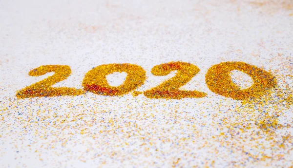 New Year 2020 is coming concept, The yellow glitter showing 2020 — Stock Photo, Image