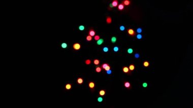 Işıklar, tatil kutlamaları için ışıltılı arka plan hediyeleri veriyor. Boşluğu kopyala.