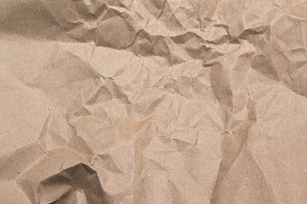 Close up of brown crumpled paper texture background.