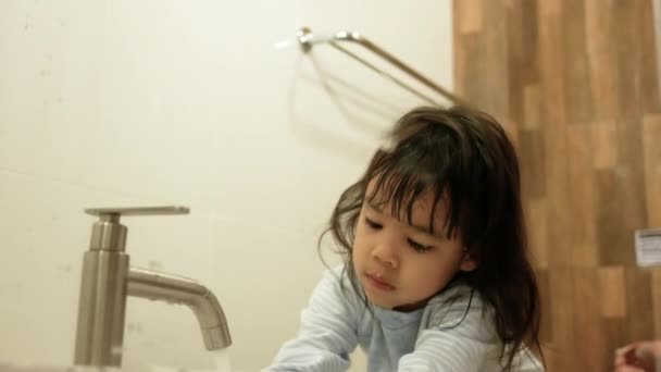 Happy Little Child Girl Brushing Teeth Clean Oral Water Bathroom — Stock Video