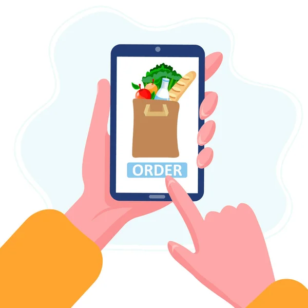 Evden akıllı telefonla bakkal siparişi ver. Marketten hızlı teslimat için taze organik yiyecek ve içecek sipariş etmek için tuşa basın. Sebze, meyve ve ekmek dolu alışveriş çantası..